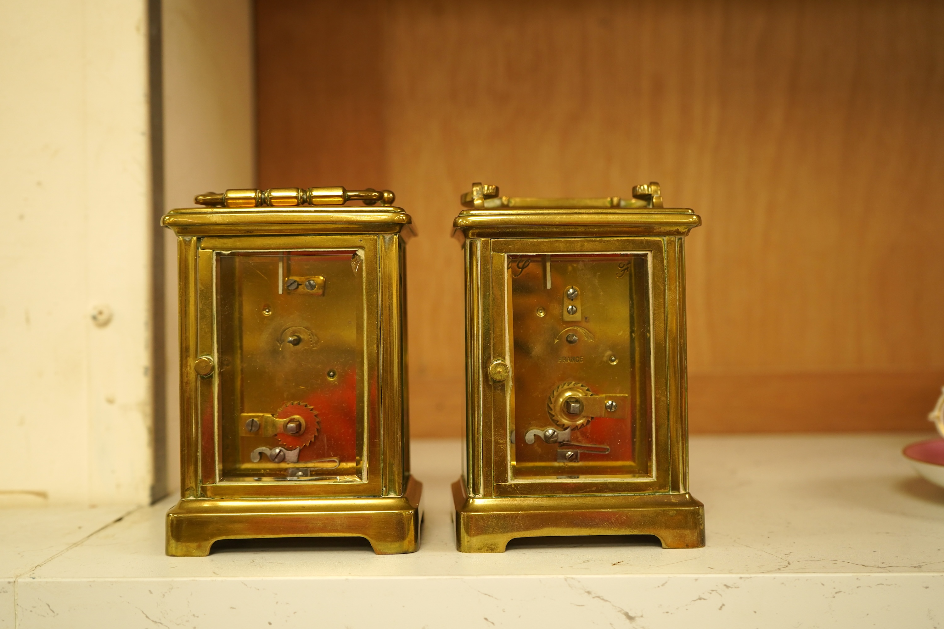 A lacquered brass champleve enamel carriage timepiece and one other, no keys, largest 15cm high